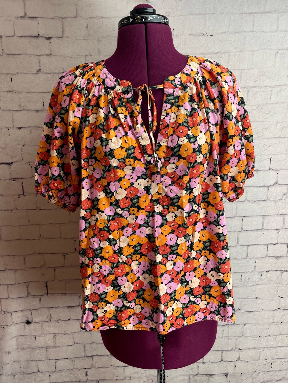 Loft size XS short sleeve floral print blouse warm colors